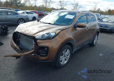 2019 Kia Sportage Lx z USA, uszkodzony, nr VIN KNDPMCAC0K7574475